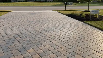 Completed interlocking paver driveway installation by professional landscapers in Evansville, IN